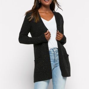 Black confetti long cardigan with two pockets. size XL. Brand is Love Ellie.